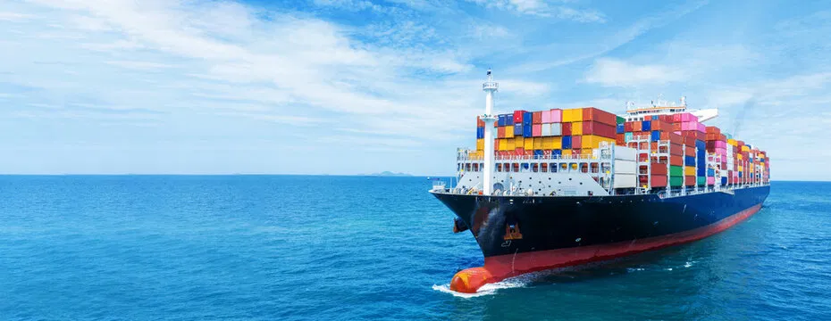 Cargo ship sailing across the open sea